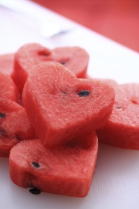 Water melon cut into heart shape.